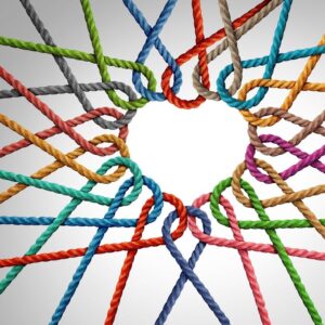 Image of colorful strings connected together into the shape of a heart.